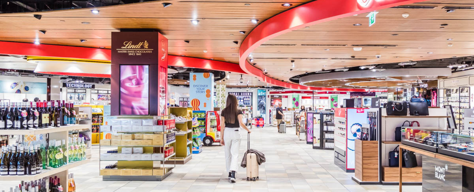 Traveller walking through LOTTE Duty Free